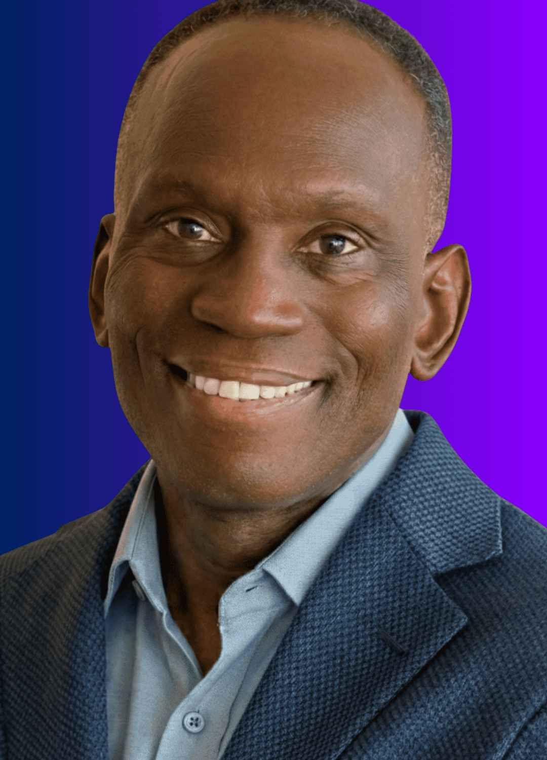 Headshot of a middle-aged man smiling, wearing a blue blazer over a light blue button-down shirt, set against a blue-to-purple gradient background. The article title “Fractional CAIOs Explained: The Executives That Make AI Work” is associated with this image.
