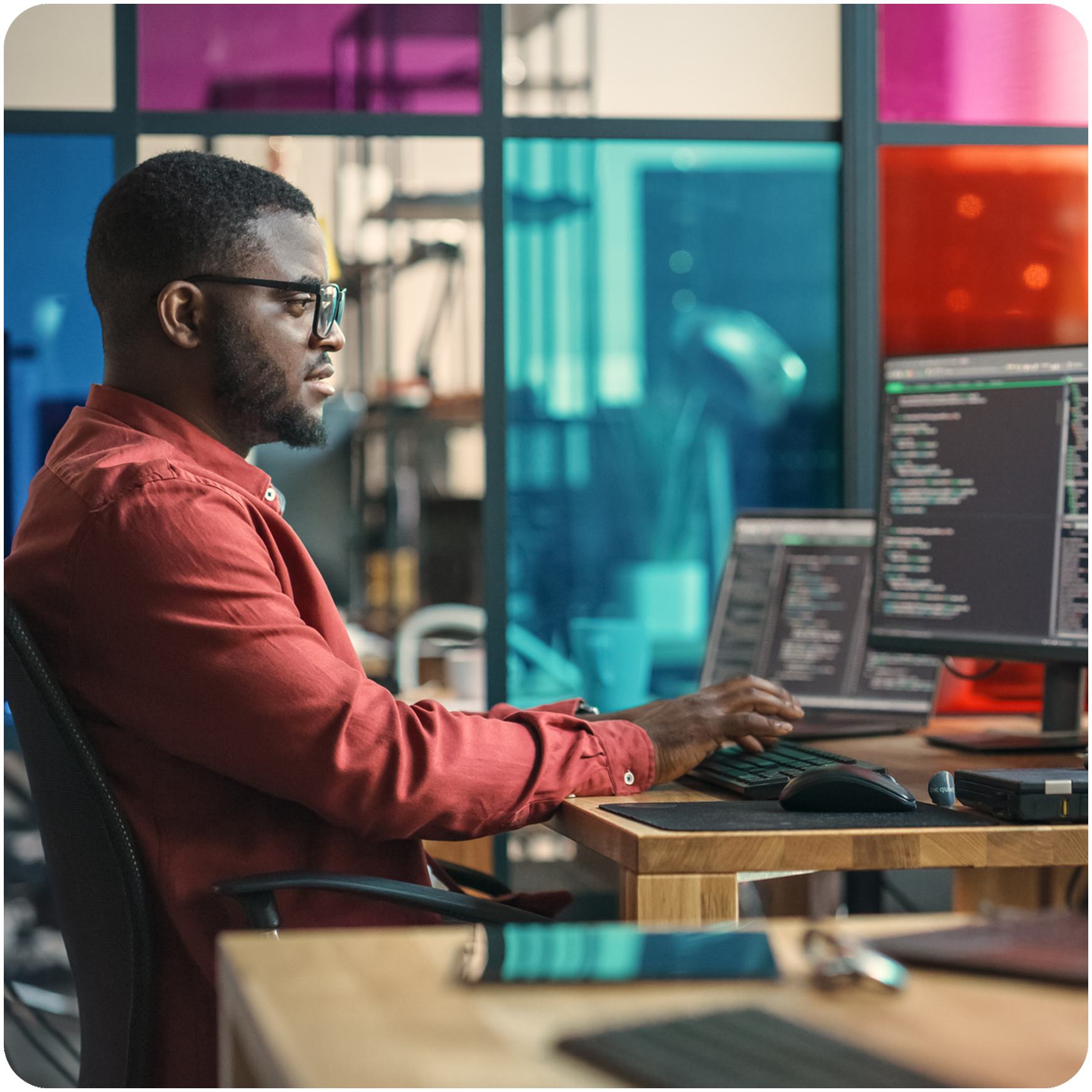 technology professional working at desk