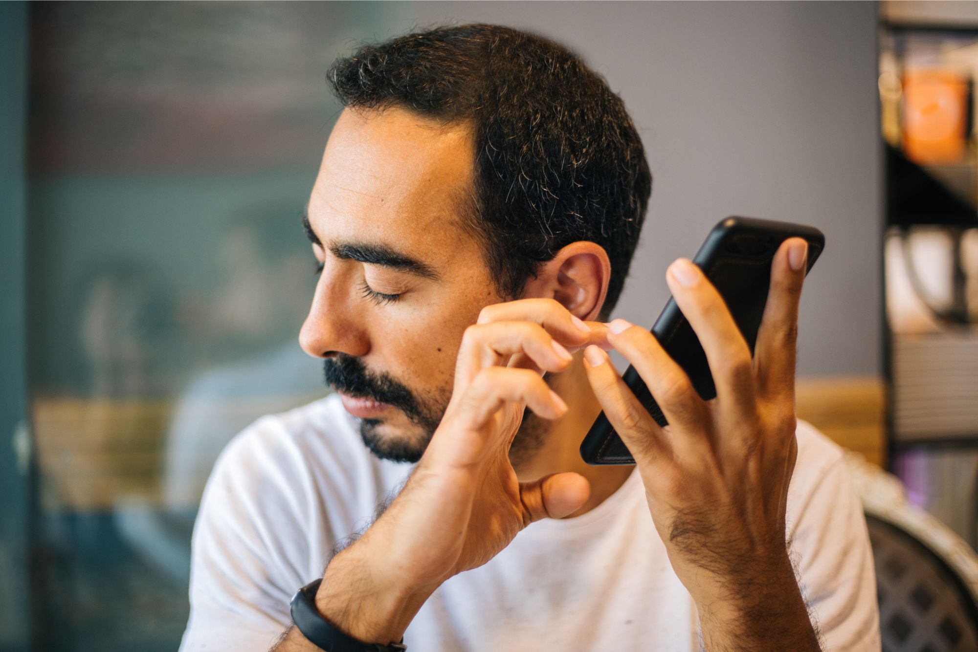 Blind man using assistive technology to find digital accessibility roles