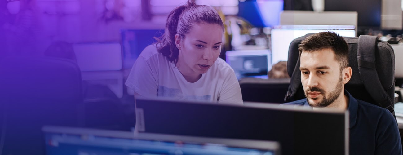Technology professionals collaborating to implement AI enablement solutions that help organizations adopt, scale, and maximize the value of artificial intelligence.